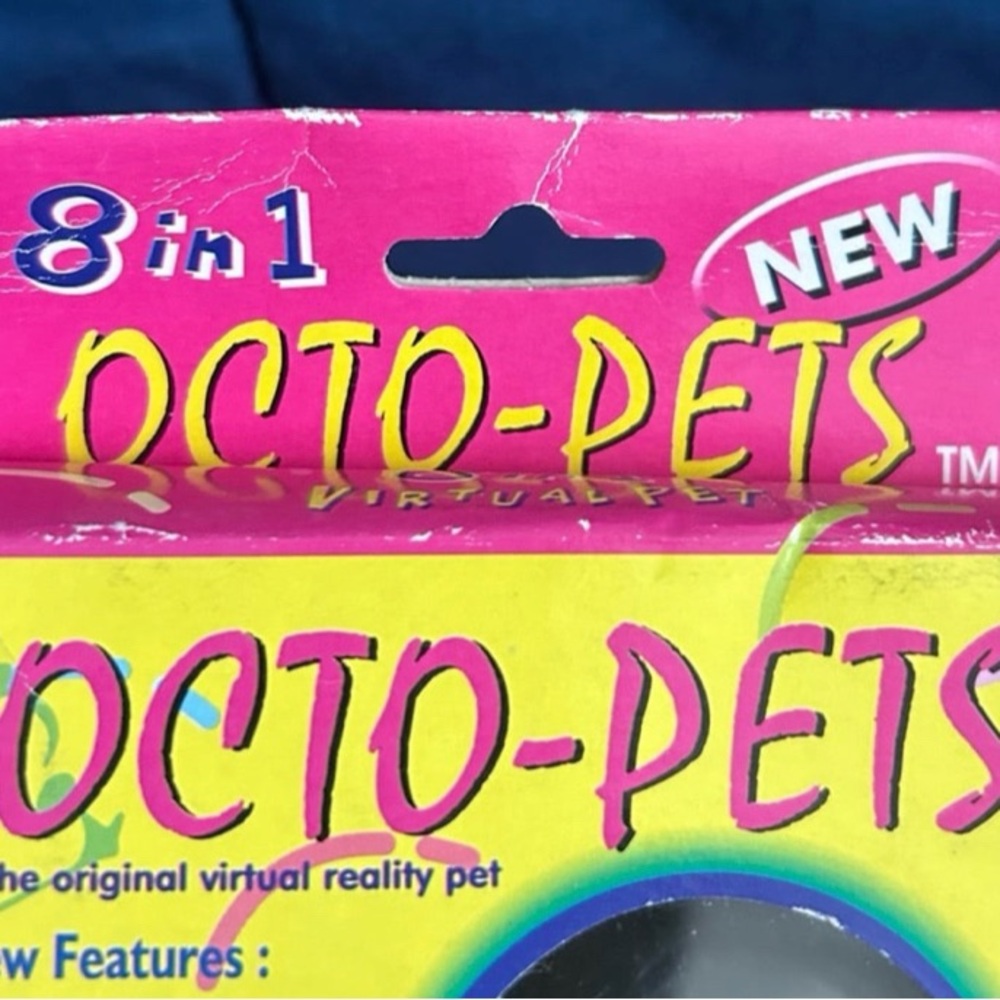 Octo-Pets 8 in 1 Virtual Pet Tamagotchi Style 1997 SEALED - Picture 7 of 12
